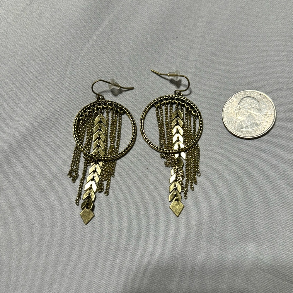 Earrings.  Brushed gold.  Costume jewelry.